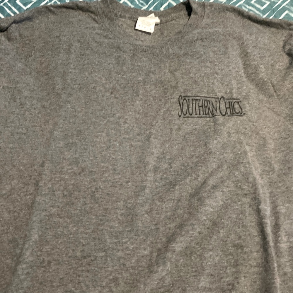 Grey with blue,red and cheetah print on the back, size m
